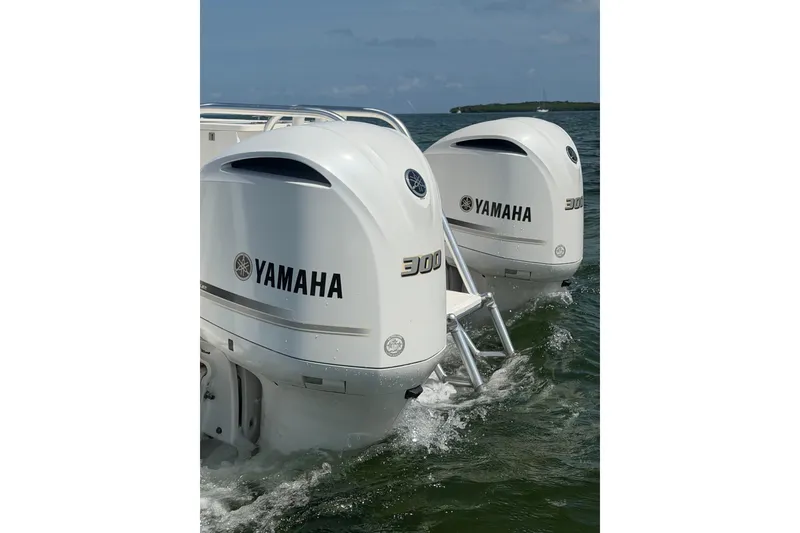 Slide: The Image of Twin Yamaha 300 outboard engines on a 2020 World Cat 325 CC boat. - 33