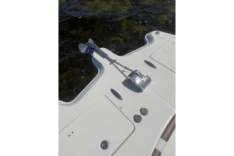 Slide: The Image of Anchor and chain on 2020 World Cat 325 CC boat deck by the water. - 34