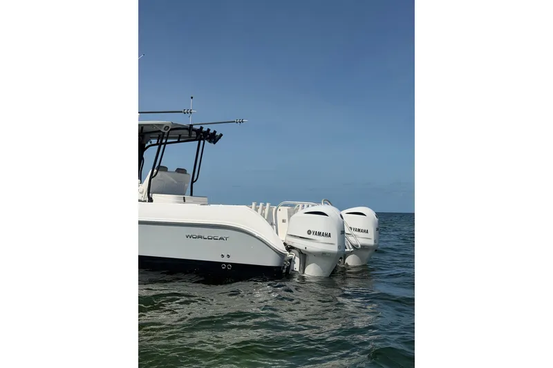 Slide: The Image of 2020 World Cat 325 CC boat with Yamaha engines on the water. - 35