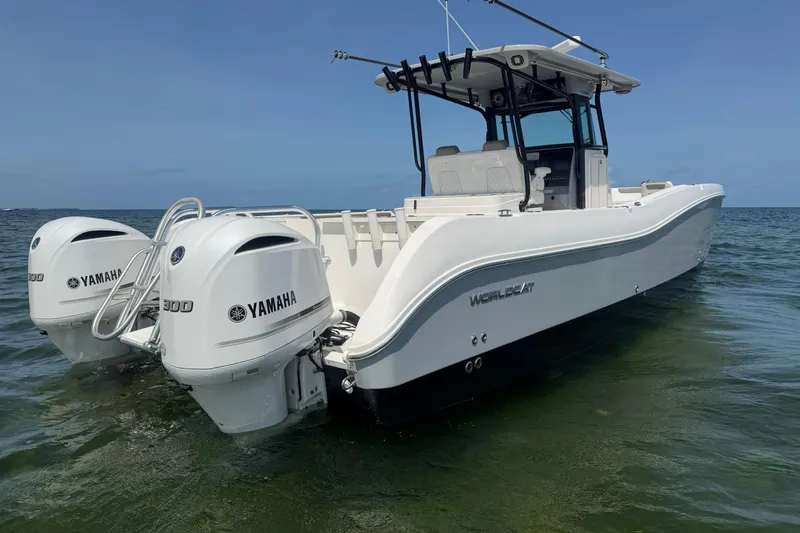 Slide: The Image of 2020 World Cat 325 CC boat with twin Yamaha 300 engines on the water. - 39