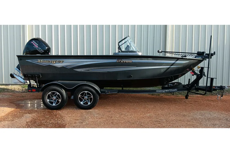 The Image of 2025 Ranger VX1788 WT fishing boat on trailer, parked outdoors. - 0