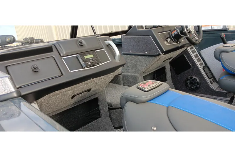 Slide: The Image of 2025 Ranger VX1788 WT boat interior with modern dashboard and seating. - 17