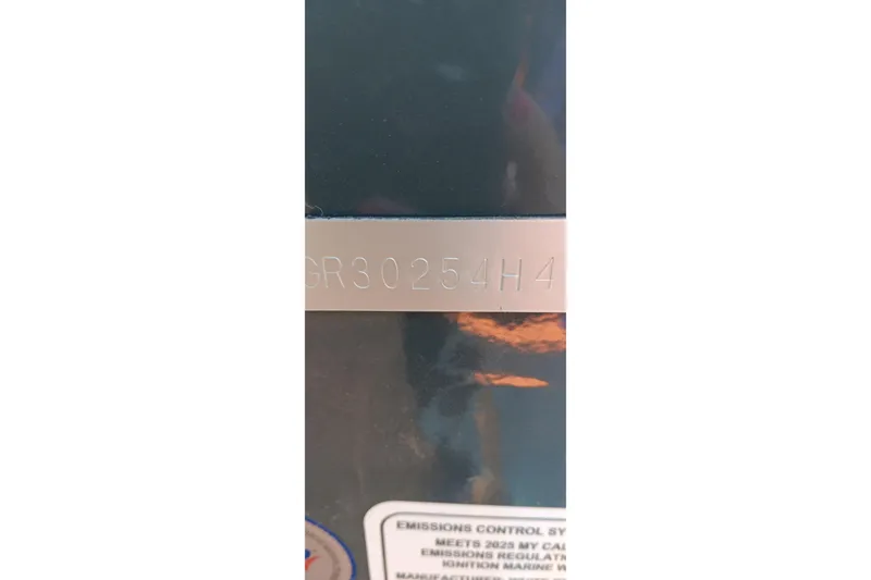 Slide: The Image of 2025 Ranger VX1788 WT serial number plate with emissions control label. - 25