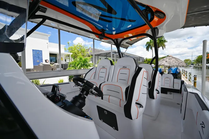Slide: The Image of Interior view of 2027 Renegade 38' Open boat with modern seating and sleek design. - 15