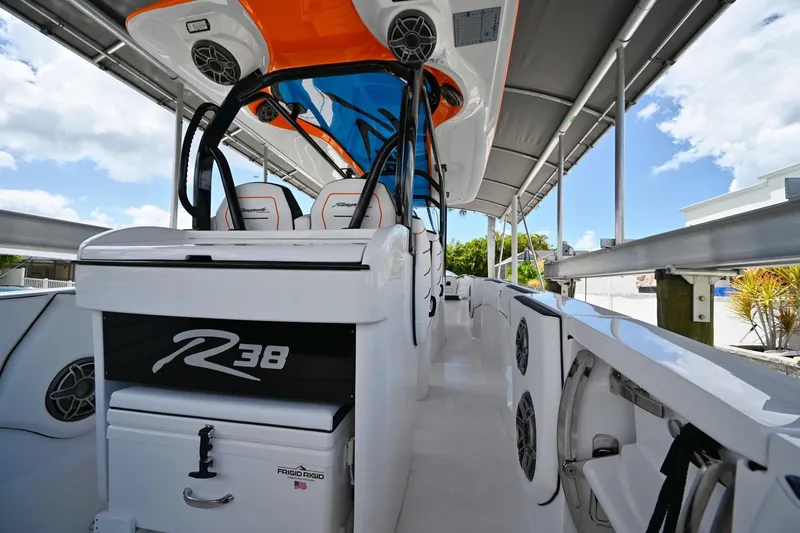 Slide: The Image of 2027 Renegade 38' Open boat interior with sleek design and advanced audio system. - 17