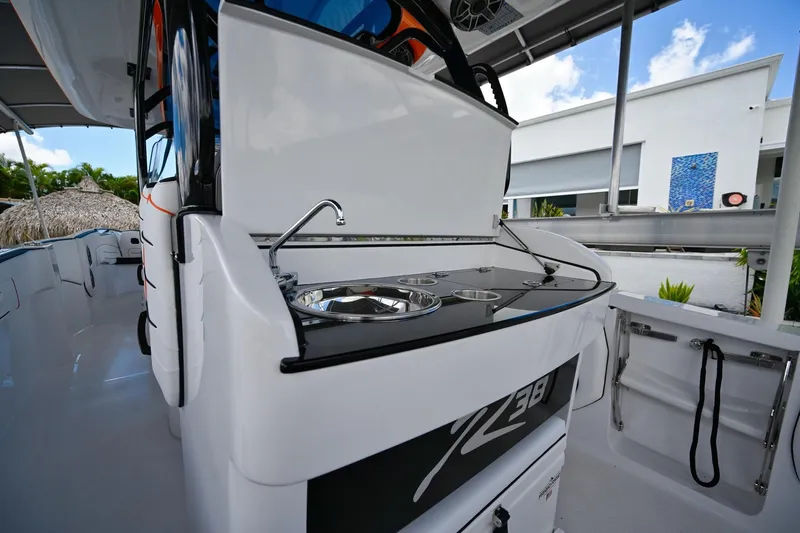 Slide: The Image of 2027 Renegade 38' Open boat with sleek onboard kitchen setup. - 24