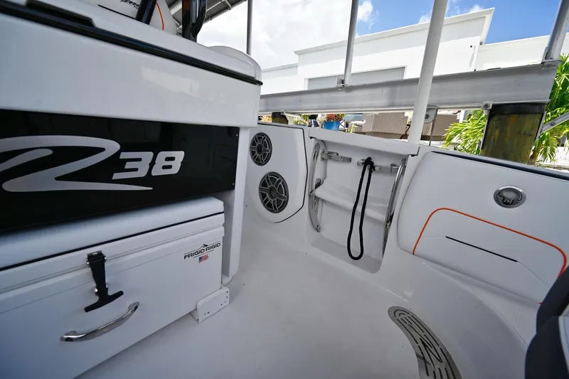 Slide: The Image of Interior view of 2027 Renegade 38' Open boat, featuring sleek design and modern amenities. - 25