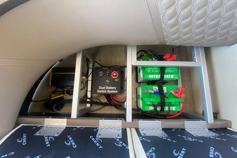 Slide: The Image of 2023 Crest Classic DLX 240 SLC dual battery switch system with Interstate batteries. - 11