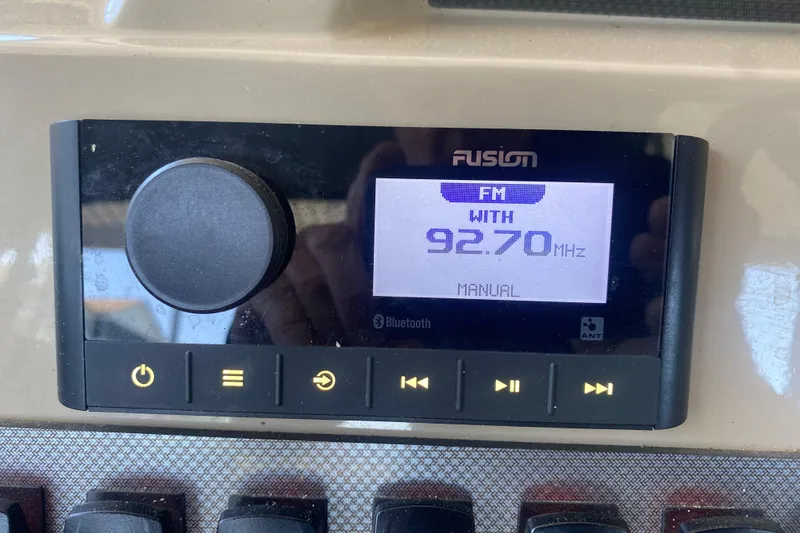 Slide: The Image of Fusion radio display on 2023 Crest Classic DLX 240 SLC, tuned to 92.70 MHz FM. - 20