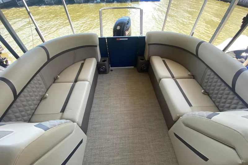 Slide: The Image of Luxurious seating on 2023 Crest Classic DLX 240 SLC pontoon boat interior. - 8