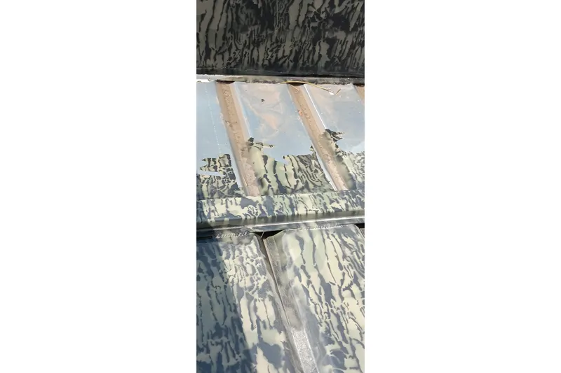 Slide: The Image of 2026 Tracker Topper 1542 LW Riveted Jon boat interior with camouflage pattern. - 19
