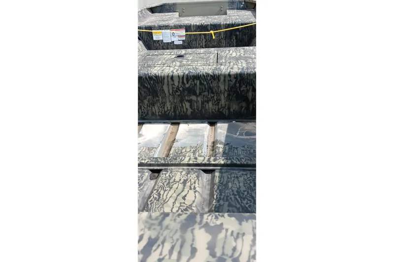 Slide: The Image of 2026 Tracker Topper 1542 LW Riveted Jon boat with camouflage pattern interior. - 4