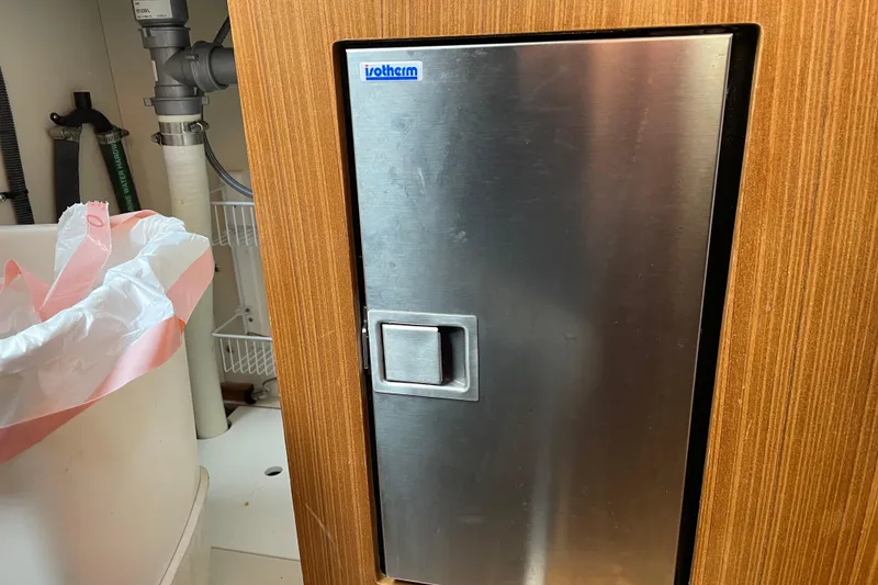 Slide: The Image of Stainless steel door in a 2014 Catalina 355 yacht interior. - 14