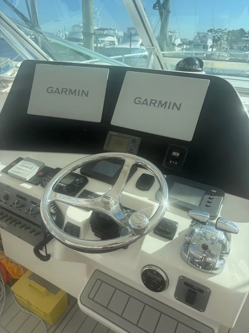 Slide: The Image of 2008 Rampage EXPRESS helm with Garmin displays and controls. - 4