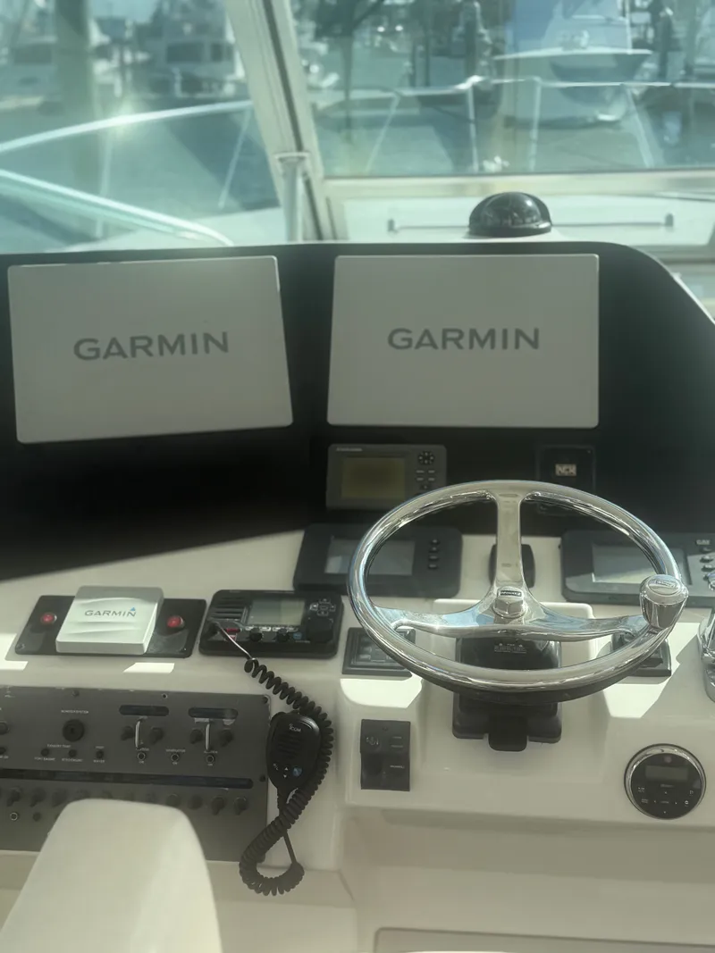 Slide: The Image of 2008 Rampage EXPRESS helm with Garmin displays and controls. - 5