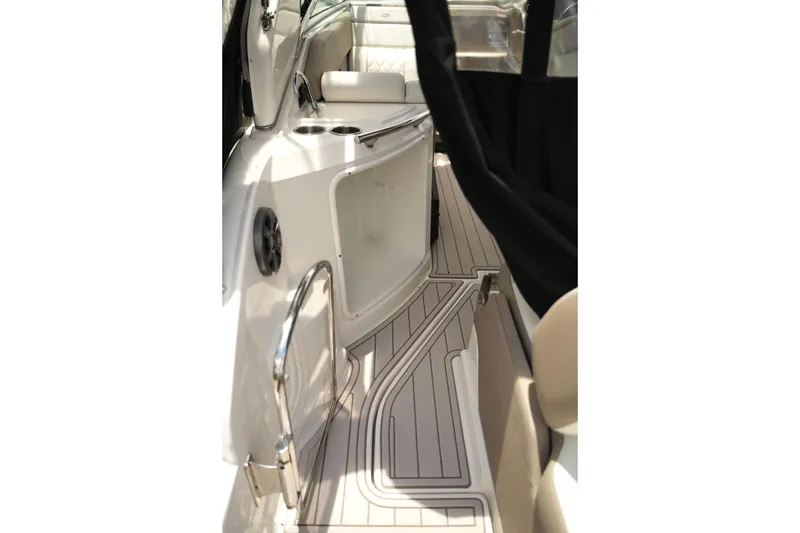 Slide: The Image of Interior view of 2018 Regal 28 Express boat, featuring sleek design and modern amenities. - 22