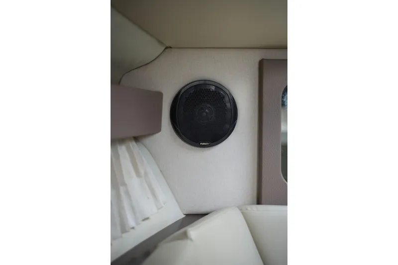 Slide: The Image of Interior speaker of 2018 Regal 28 Express boat, featuring Fusion audio system. - 42