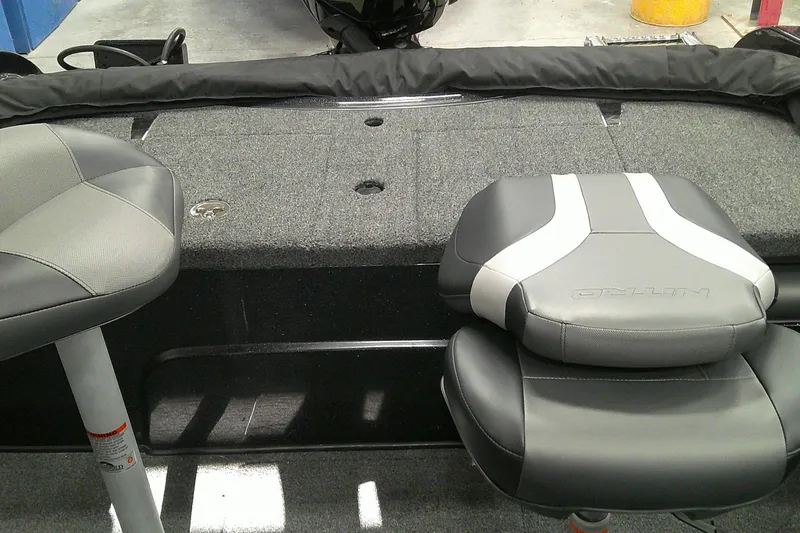 Slide: The Image of Interior of 2026 Nitro ZV19 Sport Pro boat with cushioned seating. - 10
