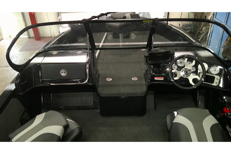 Slide: The Image of 2026 Nitro ZV19 Sport Pro boat interior with modern dashboard and seating. - 11