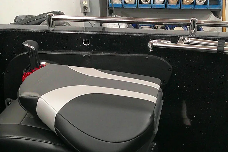 Slide: The Image of Interior of 2026 Nitro ZV19 Sport Pro boat with sleek seating and control panel. - 12