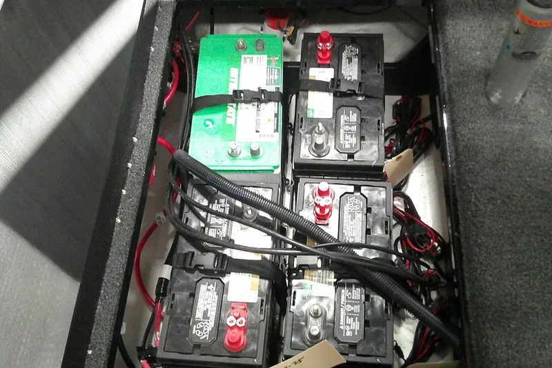 Slide: The Image of Battery compartment of 2026 Nitro ZV19 Sport Pro, featuring multiple connected batteries. - 9