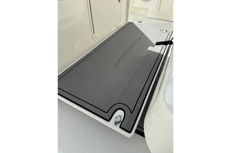 Slide: The Image of 2023 World Cat 325 CC boat deck with branded non-slip surface. - 22