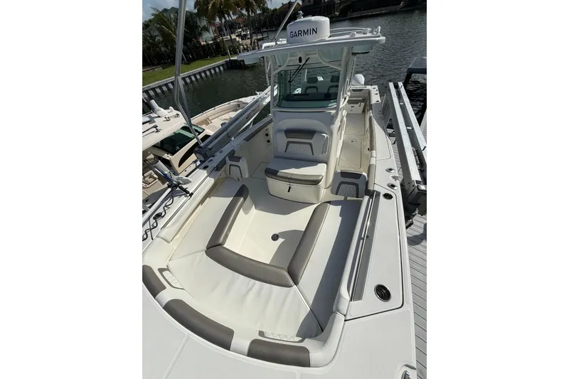 Slide: The Image of 2023 World Cat 325 CC boat with spacious seating and Garmin navigation system. - 32