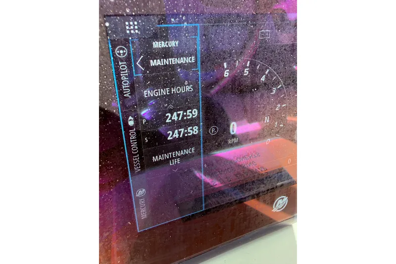 Slide: The Image of Dashboard of 2023 World Cat 325 CC showing engine hours and maintenance details. - 33