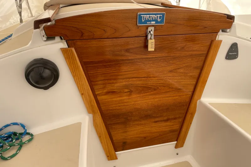 Slide: The Image of Wooden hatch of 2025 Tartan Fantail sailboat with lock and nautical equipment. - 10