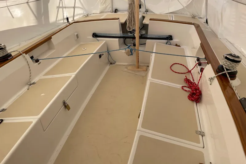Slide: The Image of Interior view of 2025 Tartan Fantail sailboat cockpit with ropes and seating. - 11
