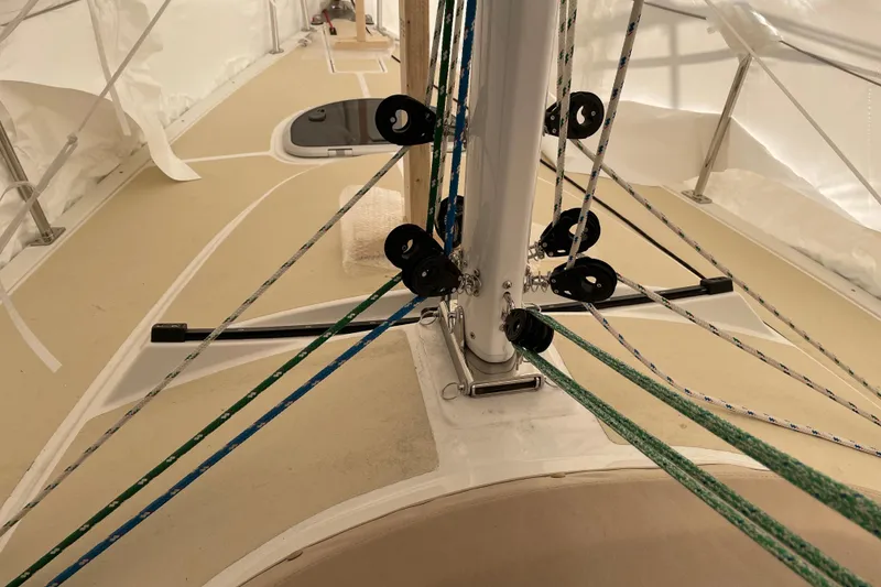 Slide: The Image of Tartan Fantail 2025 sailboat deck with rigging and ropes. - 17