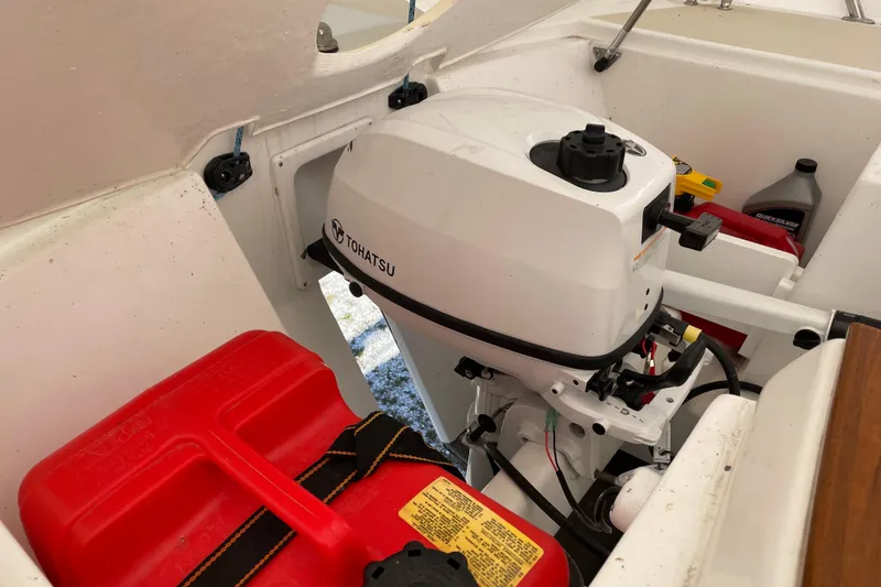 Slide: The Image of Tartan Fantail 2025 boat engine compartment with Tohatsu motor and fuel tank. - 18