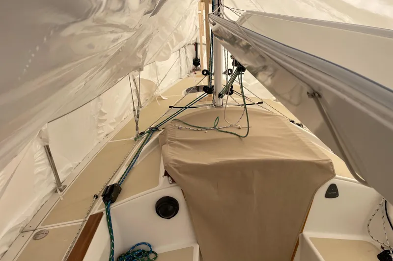 Slide: The Image of Interior view of 2025 Tartan Fantail sailboat, showcasing rigging and covered cockpit area. - 9