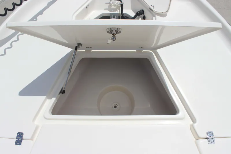 Slide: The Image of Open storage compartment on 2026 Key West 230 Bay Reef boat. - 10