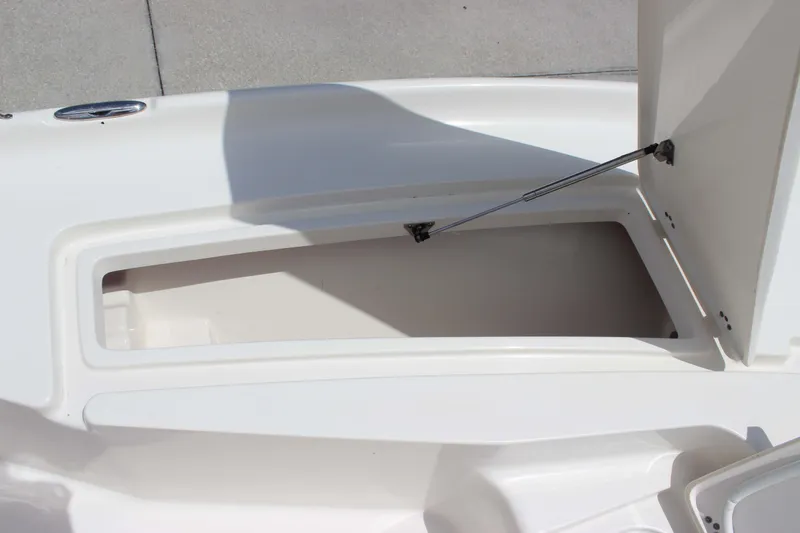 Slide: The Image of Open storage compartment on 2026 Key West 230 Bay Reef boat. - 13