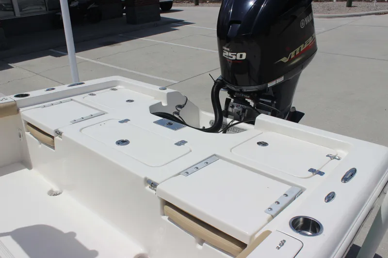 Slide: The Image of 2026 Key West 230 Bay Reef boat with Yamaha 250 engine, featuring spacious deck layout. - 18
