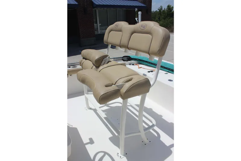 Slide: The Image of Beige seating on 2026 Key West 230 Bay Reef boat, outdoor setting. - 6