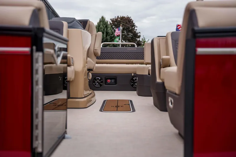 Slide: The Image of 2026 Harris Sunliner 230 interior with beige seating and modern design elements. - 19