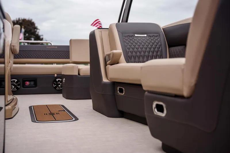 Slide: The Image of Luxurious interior of 2026 Harris Sunliner 230 pontoon boat with plush seating and elegant design. - 20