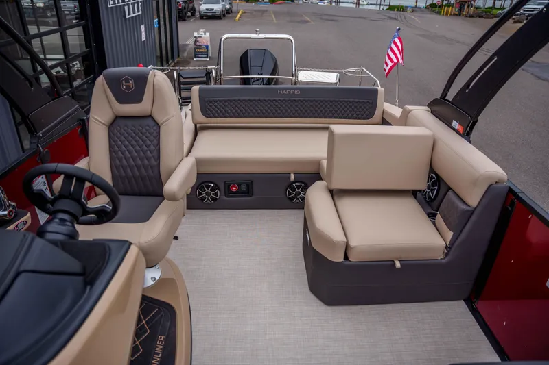 Slide: The Image of Luxurious interior of 2026 Harris Sunliner 230 pontoon boat with plush seating and modern design. - 23