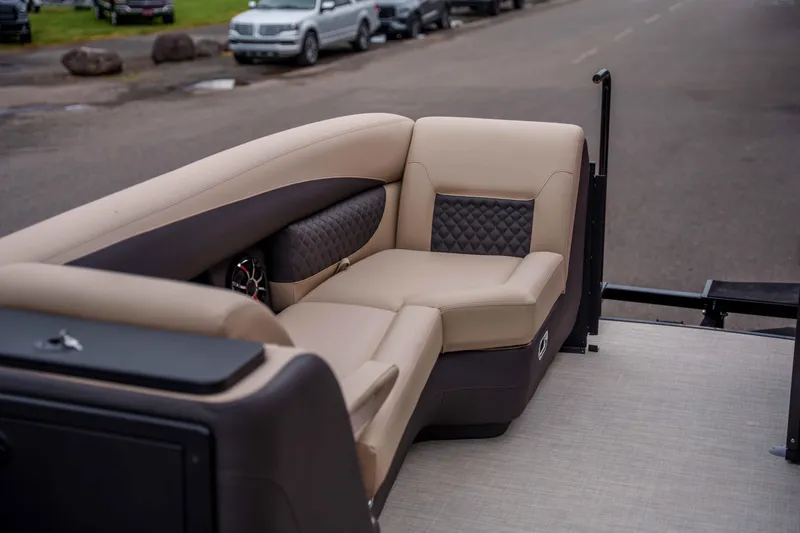 Slide: The Image of Luxurious seating on 2026 Harris Sunliner 230 pontoon boat, featuring elegant beige upholstery. - 25