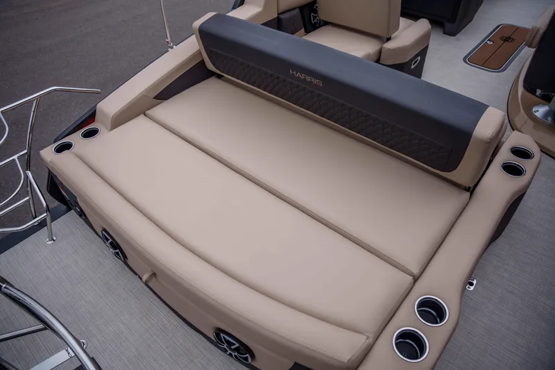 Slide: The Image of Luxurious seating on 2026 Harris Sunliner 230 boat with cup holders and elegant design. - 32