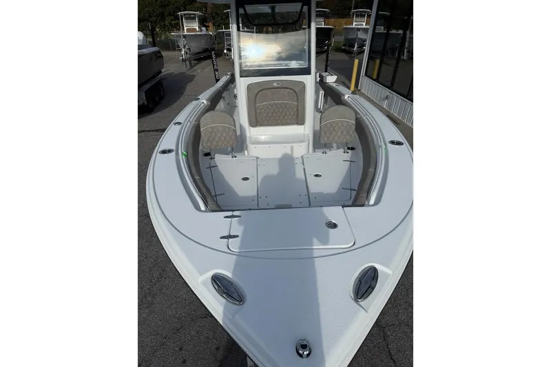 Slide: The Image of 2026 Sea Hunt Ultra 255 SE boat with spacious seating and sleek design. - 14