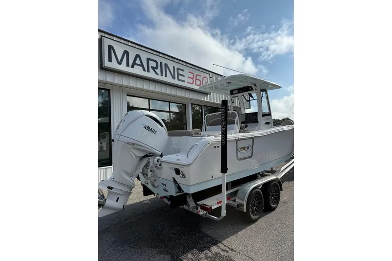 Slide: The Image of 2026 Sea Hunt Ultra 255 SE boat with Yamaha engine at Marine 360 dealership. - 2