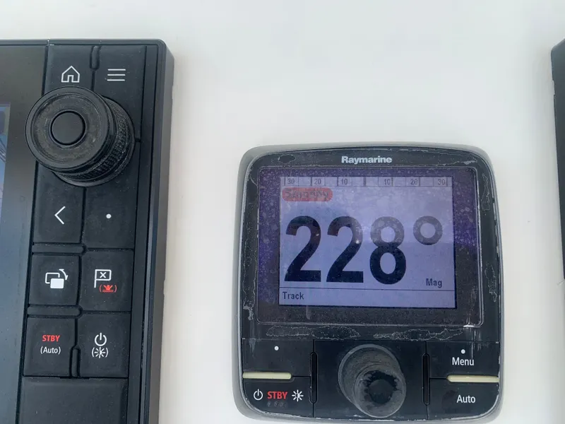 Slide: The Image of Raymarine compass display showing 228 degrees on Regulator FS 2015. - 15