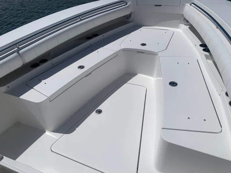 Slide: The Image of 2015 Regulator FS boat with spacious deck and storage compartments. - 33