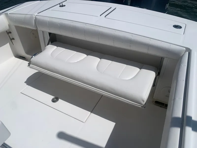 Slide: The Image of Regulator FS 2015 boat with white fold-down seat in the stern area. - 4