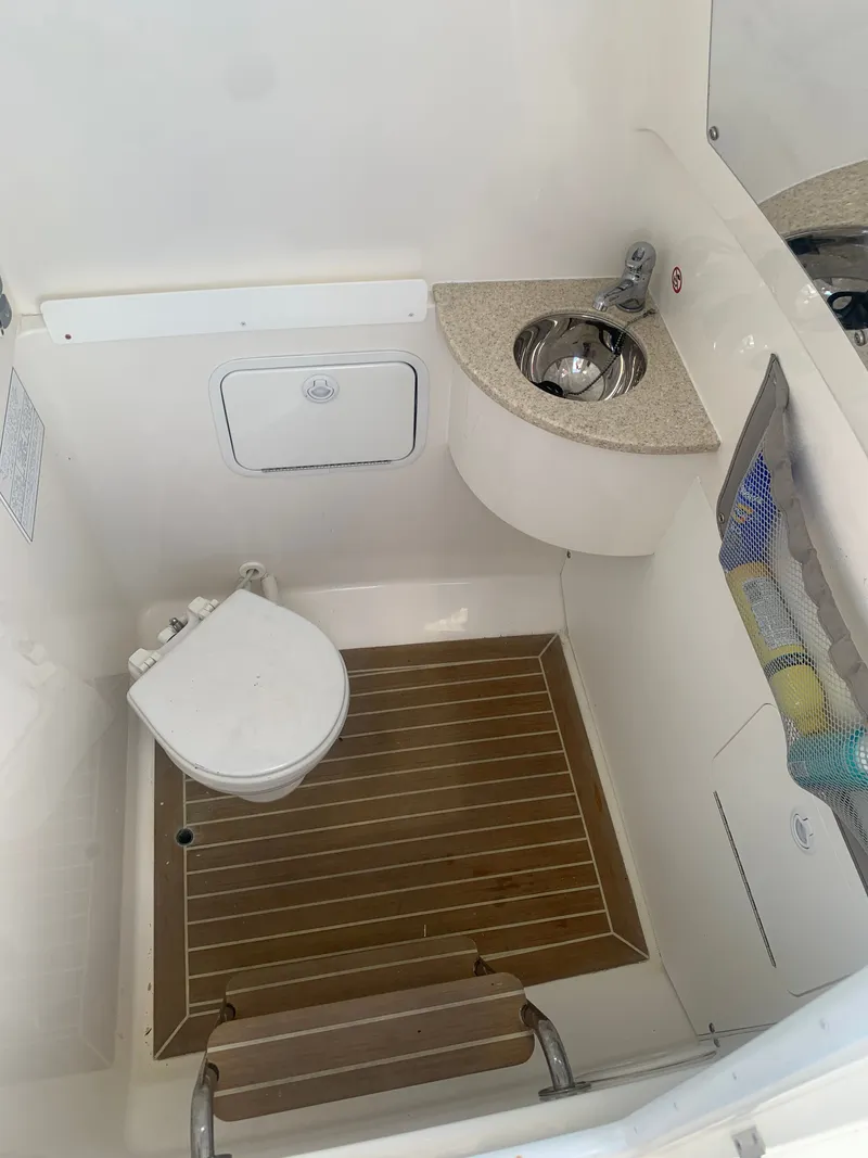 Slide: The Image of Regulator FS 2015 boat cabin with toilet and sink. - 42
