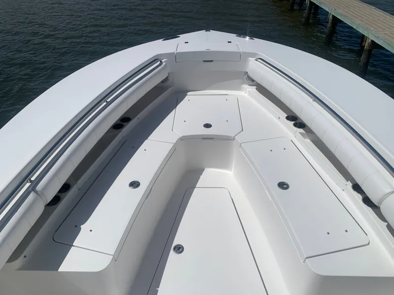 Slide: The Image of 2015 Regulator FS boat bow deck with seating area. - 5