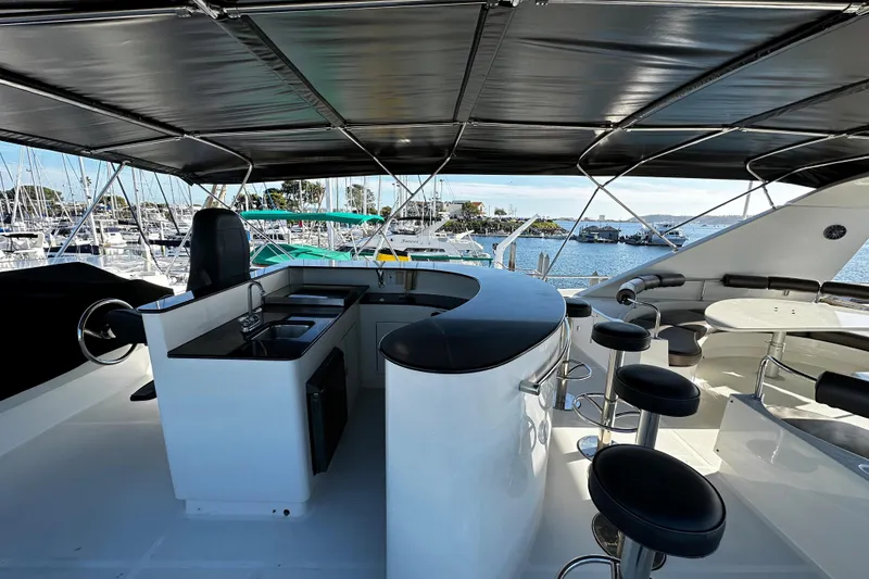 Slide: The Image of Luxurious 1996 Monte Fino 92 yacht interior with bar and seating area. - 32